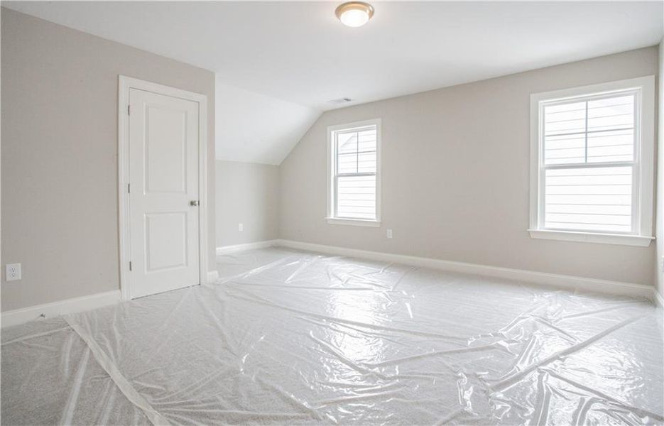 Spacious, unfurnished interior of a new home in The Birches on Maple, Carrollton (Image 10).