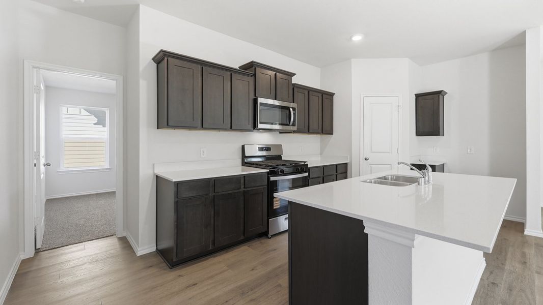 Furnished interior view inside a new home in Windrose, Pilot Point (Image 3).