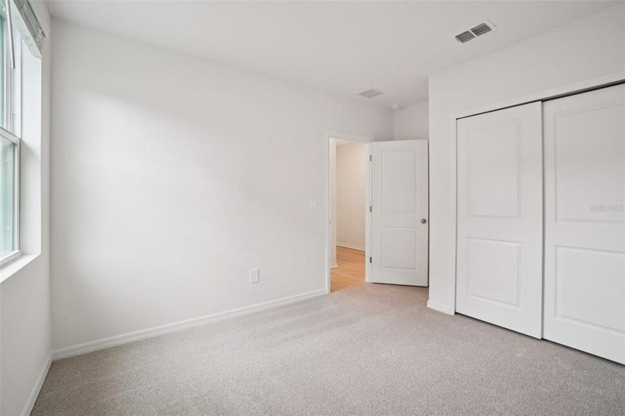 Spacious, unfurnished interior of a new home in Leyland Preserve - Classic Series, Brooksville (Image 28).