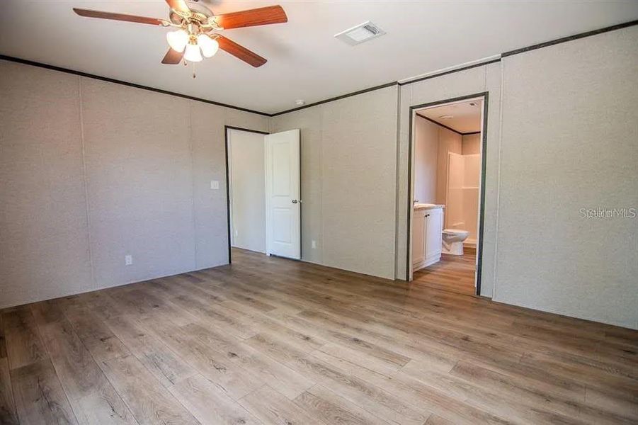 Spacious, unfurnished interior of a new home in , Okeechobee (Image 8).