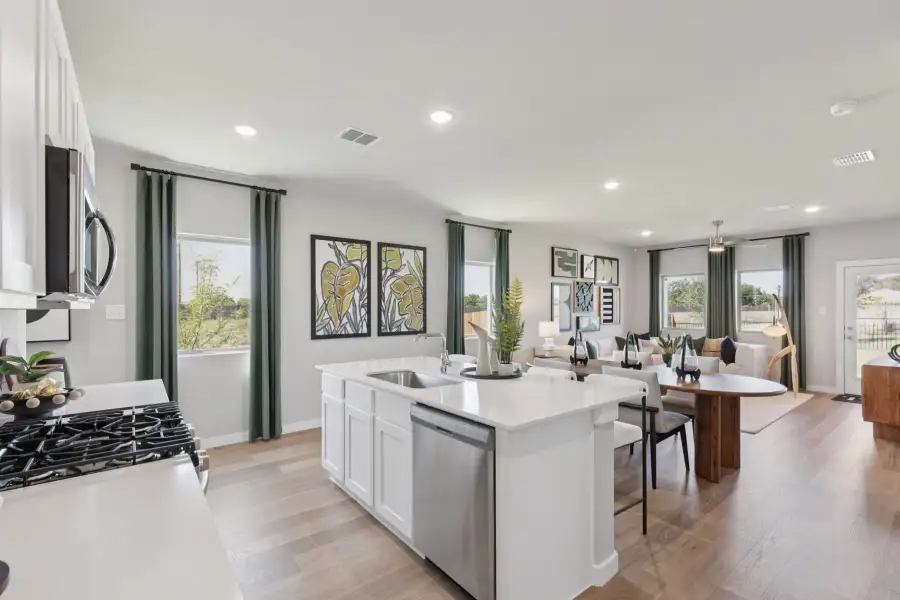Kitchen in the Magnolia home plan by Trophy Signature Homes – REPRESENTATIVE PHOTO Kitchen in the Magnolia home plan by Trophy Signature Homes – REPRESENTATIVE PHOTO