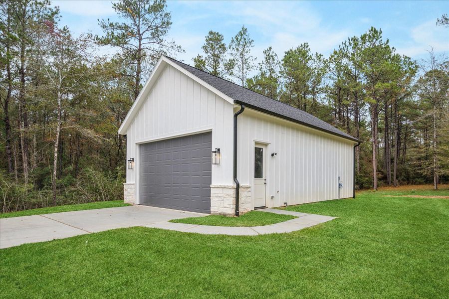 Front exterior of a new home in , Huntsville, TX, highlighting curb appeal (Image 2). Front exterior of a new home in , Huntsville, TX, highlighting curb appeal (Image 2).