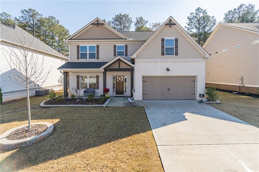 Front exterior of a new home in Enclave at Brookside Crossing, Auburn, GA, highlighting curb appeal (Image 1).