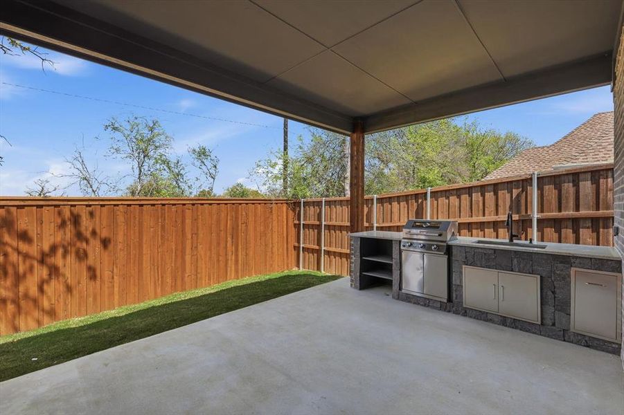 Exterior details and patio area of a home in , Denton (Image 4).