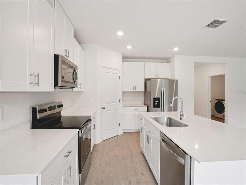 Furnished interior view inside a new home in Salt Meadows - Classic Series, Parrish (Image 6).