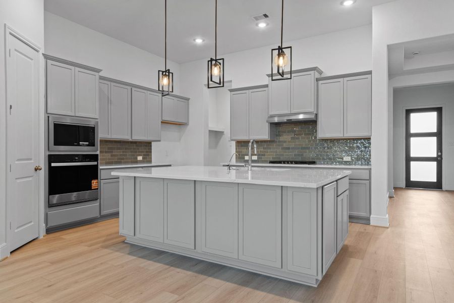 Furnished interior view inside a new home in Coastal Point, League City (Image 9).