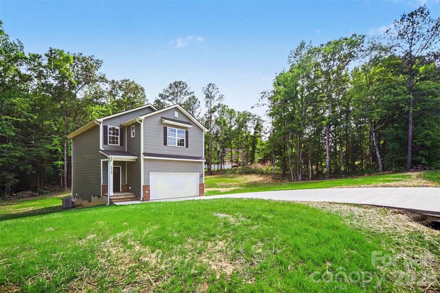 Front exterior of a new home in , Lancaster, SC, highlighting curb appeal (Image 17). Front exterior of a new home in , Lancaster, SC, highlighting curb appeal (Image 17).