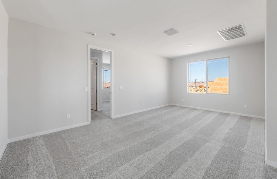 Spacious, unfurnished interior of a new home in Jorde Farms, Queen Creek (Image 22).