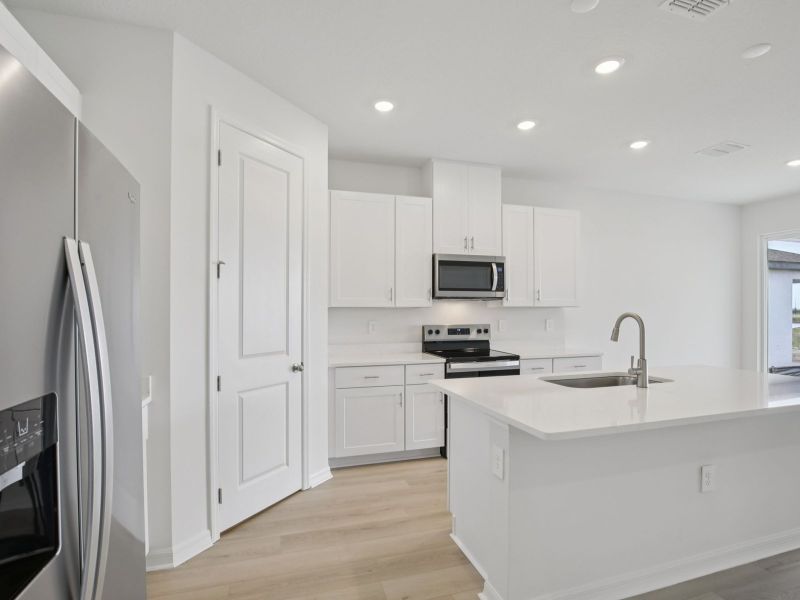 Furnished interior view inside a new home in Coasterra - Reserve Series, Palmetto (Image 3).