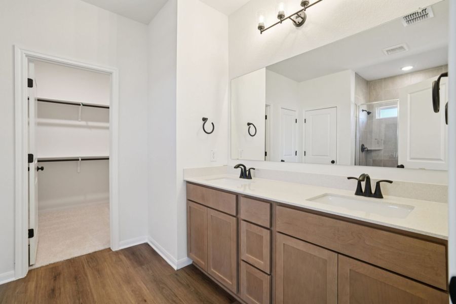 Furnished interior view inside a new home in Village at Three Oaks, Seguin (Image 11).