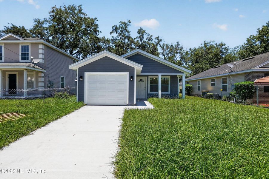 Front exterior of a new home in , Jacksonville, FL, highlighting curb appeal (Image 1). Front exterior of a new home in , Jacksonville, FL, highlighting curb appeal (Image 1).