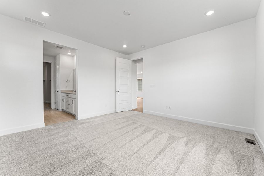 Representative unfurnished interior of a home built from the Bailey by Taylor Morrison in Dawson Trails Town Collection, Castle Rock (Image 14).
