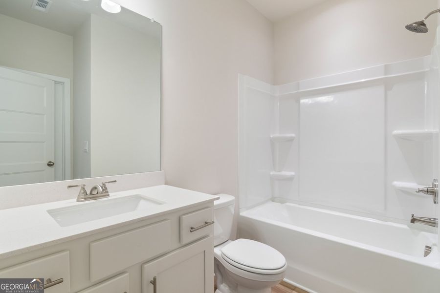 Furnished interior view inside a new home in Rosewood Lake Estates, Hoschton (Image 12).