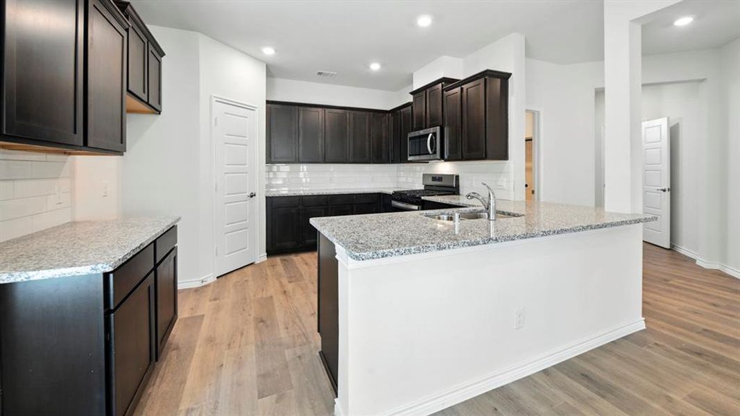 Furnished interior view inside a new home in The Woods at Lindsey Place, Anna (Image 9).