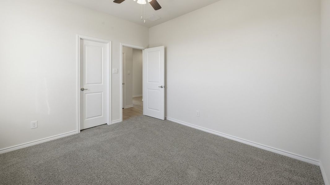 Spacious, unfurnished interior of a new home in Fireside by the Lake, Garland (Image 28).