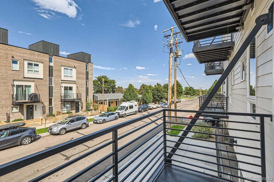 Private balcony with a glimpse of downtown