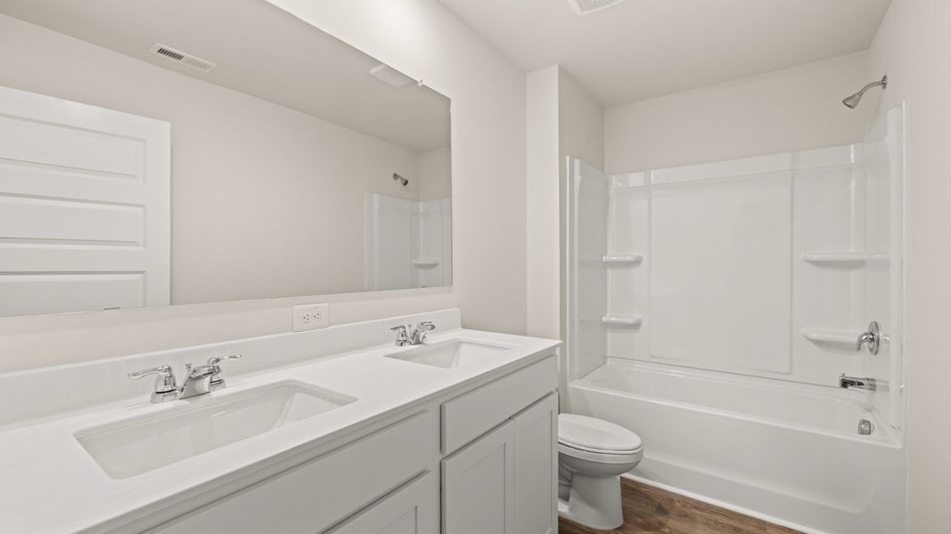 Representative furnished interior of a home built from the Galen by D.R. Horton in Jackson Landing, Jefferson (Image 11).