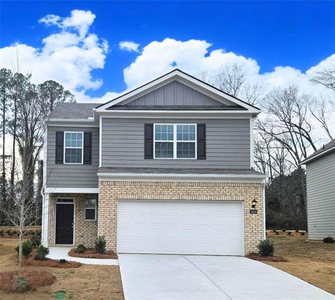 Front exterior of a new home in Sherwood Manor, South Fulton, GA, highlighting curb appeal (Image 1). Front exterior of a new home in Sherwood Manor, South Fulton, GA, highlighting curb appeal (Image 1).