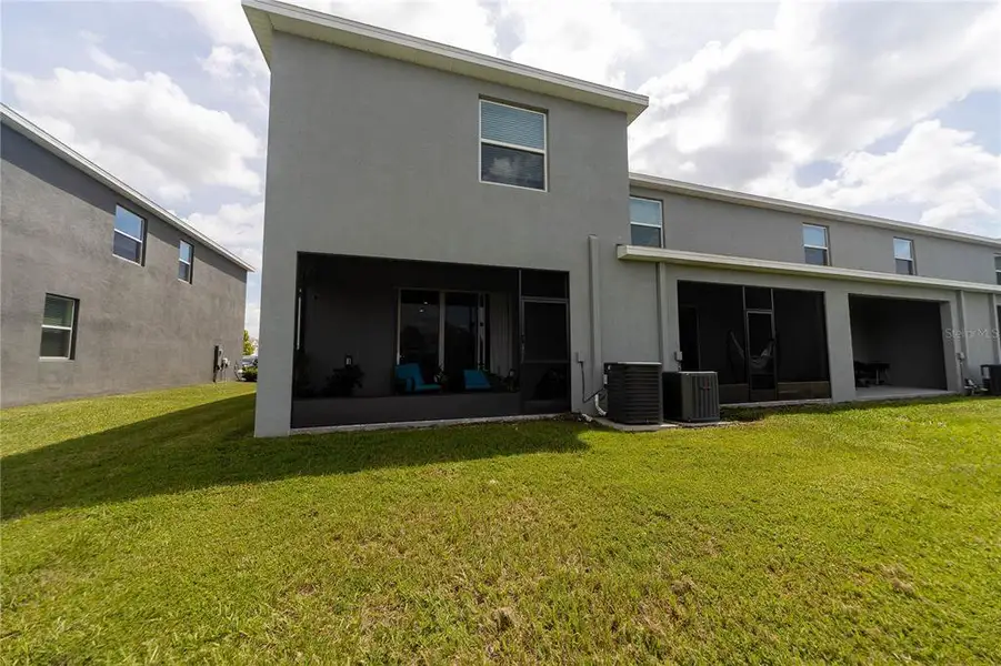 Front exterior of a new home in , Wesley Chapel, FL, highlighting curb appeal (Image 1). Front exterior of a new home in , Wesley Chapel, FL, highlighting curb appeal (Image 1).