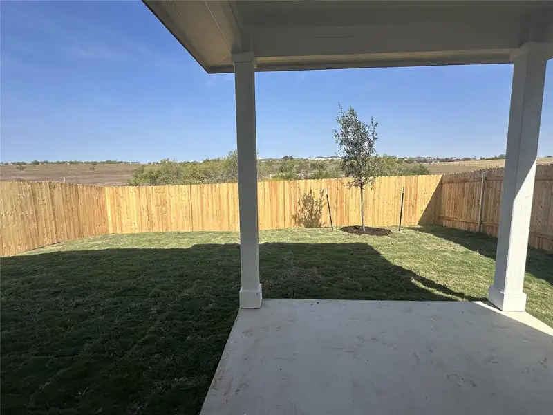 Exterior details and patio area of a home in Porter Country, Buda (Image 1). Exterior details and patio area of a home in Porter Country, Buda (Image 1).