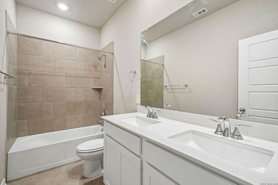 Furnished interior view inside a new home in Royal Crest, San Antonio (Image 14).
