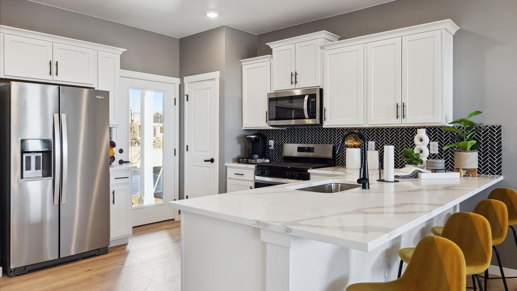 Furnished interior view inside a new home in Horizon Uptown, Aurora (Image 5).