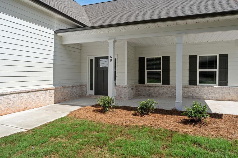 Front exterior of a new home in , McDonough, GA, highlighting curb appeal (Image 15). Front exterior of a new home in , McDonough, GA, highlighting curb appeal (Image 15).