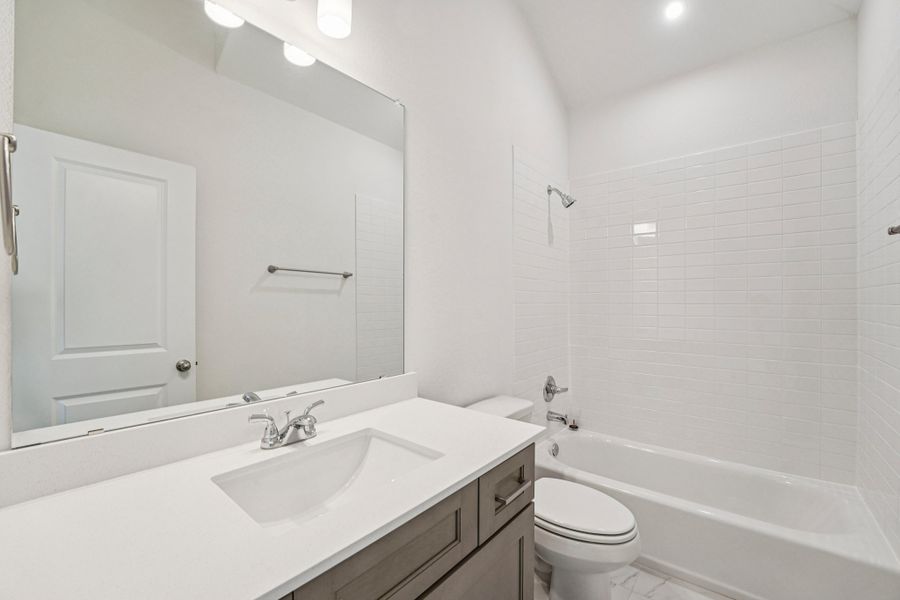 Furnished interior view inside a new home in Sage Hollow, Kyle (Image 6).