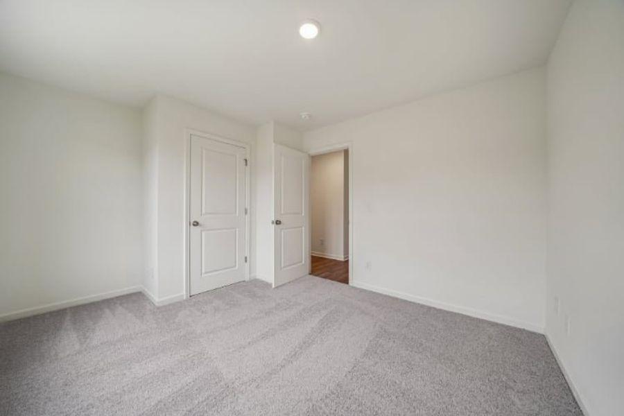 A room with white doors.