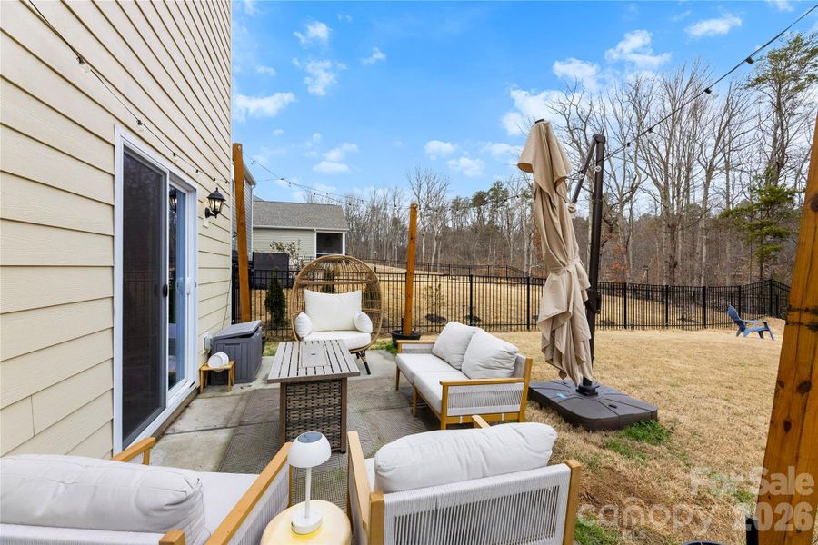 Exterior details and patio area of a home in Calvin Creek, Troutman (Image 3).