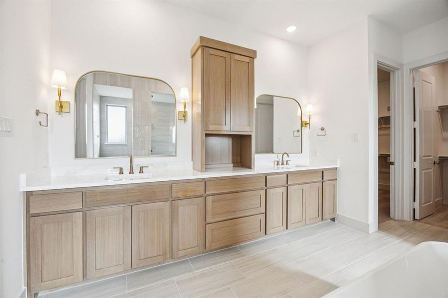 No shortage of space or style in this dream owner's bath designed with two in mind!