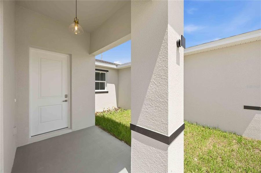 Exterior details and patio area of a home in , Winter Haven (Image 23).