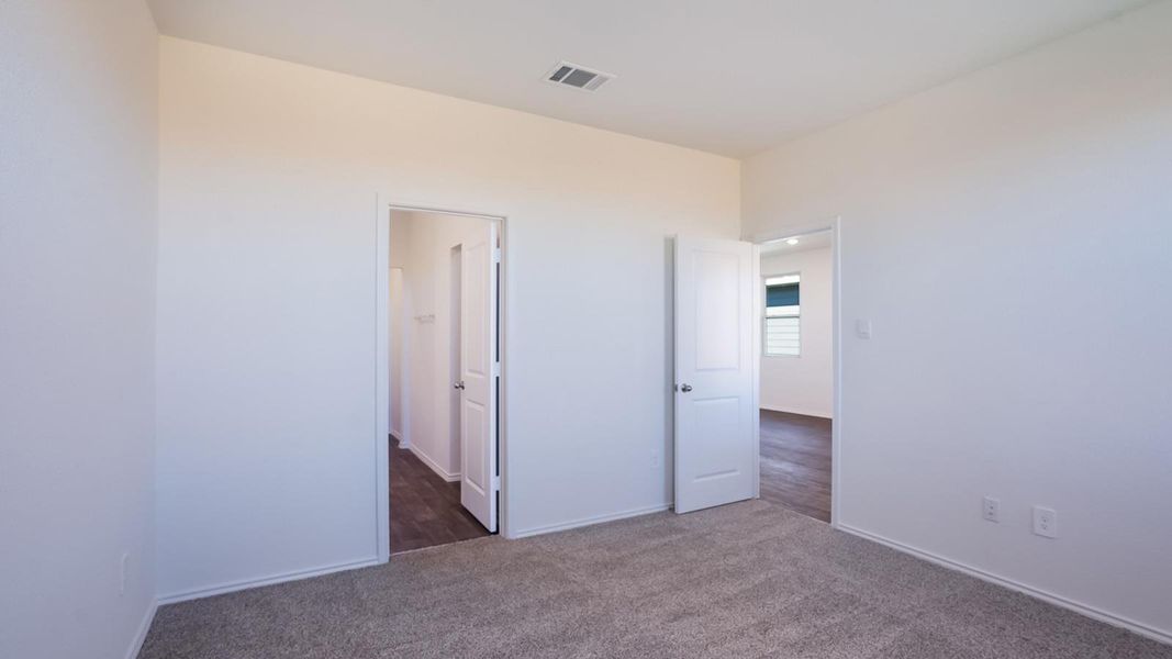Spacious, unfurnished interior of a new home in Marigold, Kyle (Image 18).