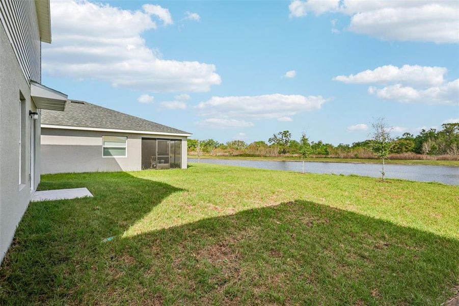 Exterior details and patio area of a home in Eagle Hammock, Eagle Lake (Image 15).