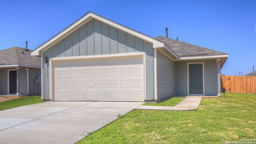Front exterior of a new home in Navarro Fields, Seguin, TX, highlighting curb appeal (Image 2). Front exterior of a new home in Navarro Fields, Seguin, TX, highlighting curb appeal (Image 2).