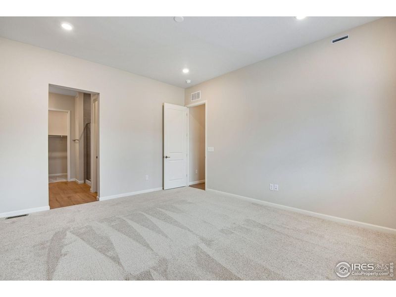 Spacious, unfurnished interior of a new home in Westside Crossing, Berthoud (Image 28).