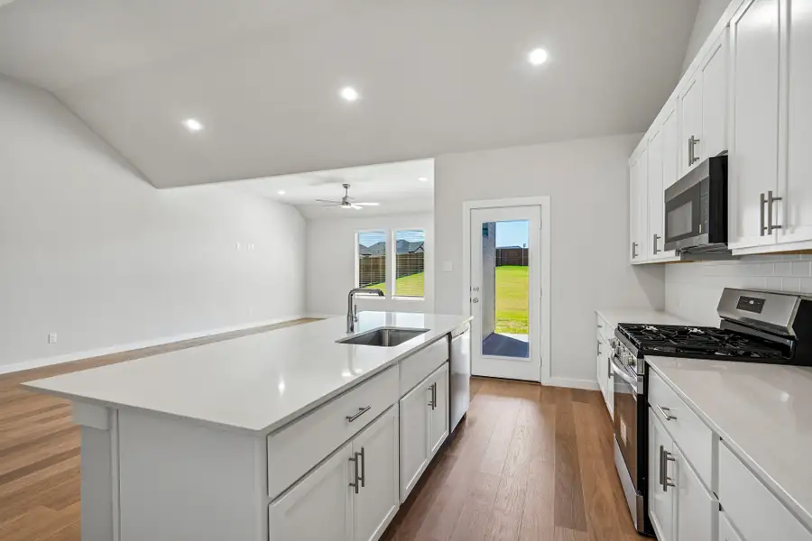 Kitchen in the Wimbledon home plan by Trophy Signature Homes