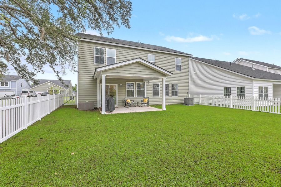 Exterior details and patio area of a home in Limehouse Farms, Summerville (Image 25).
