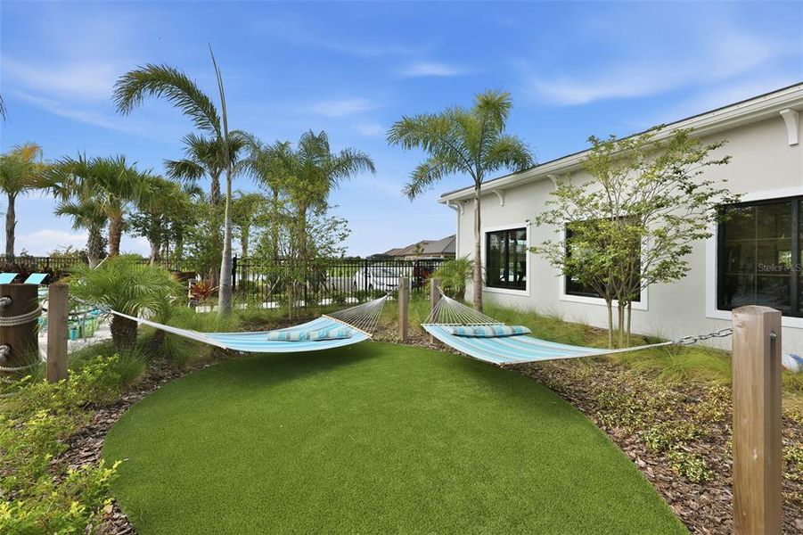 Exterior details and patio area of a home in Prosperity Lakes Active Adult, Parrish (Image 29).