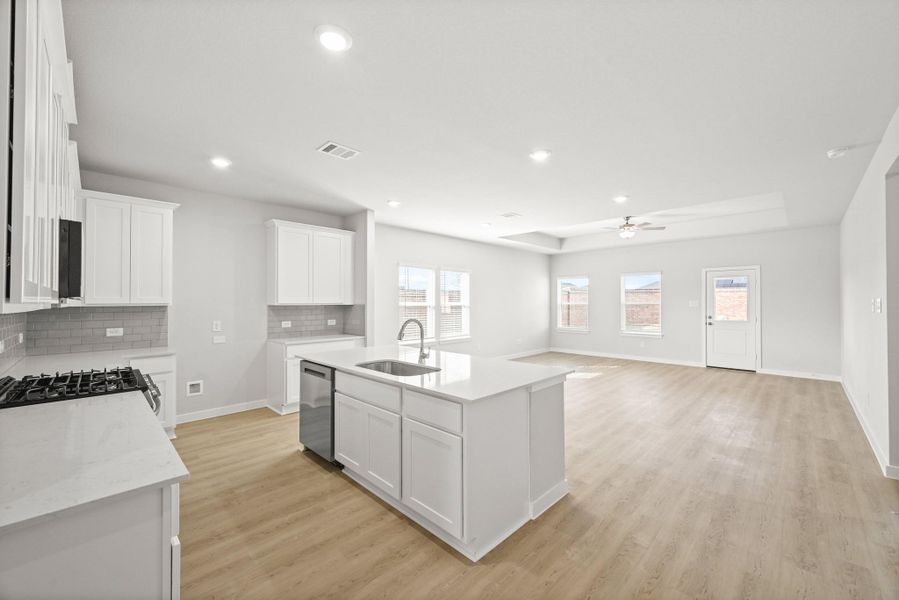 Furnished interior view inside a new home in Sunterra, Katy (Image 12).