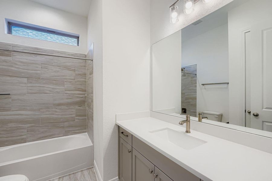 Furnished interior view inside a new home in 6 Creeks, Kyle (Image 3).