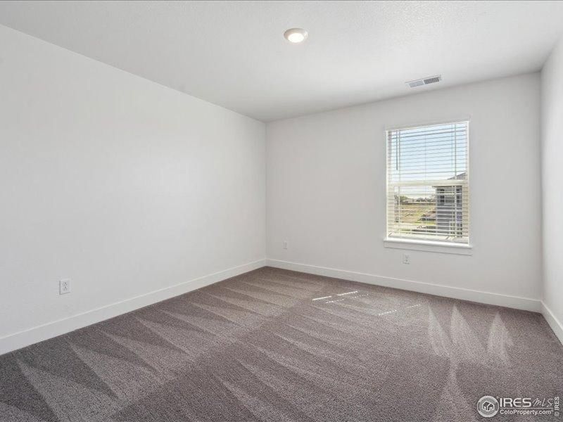 Spacious, unfurnished interior of a new home in Vantage, Berthoud (Image 13).