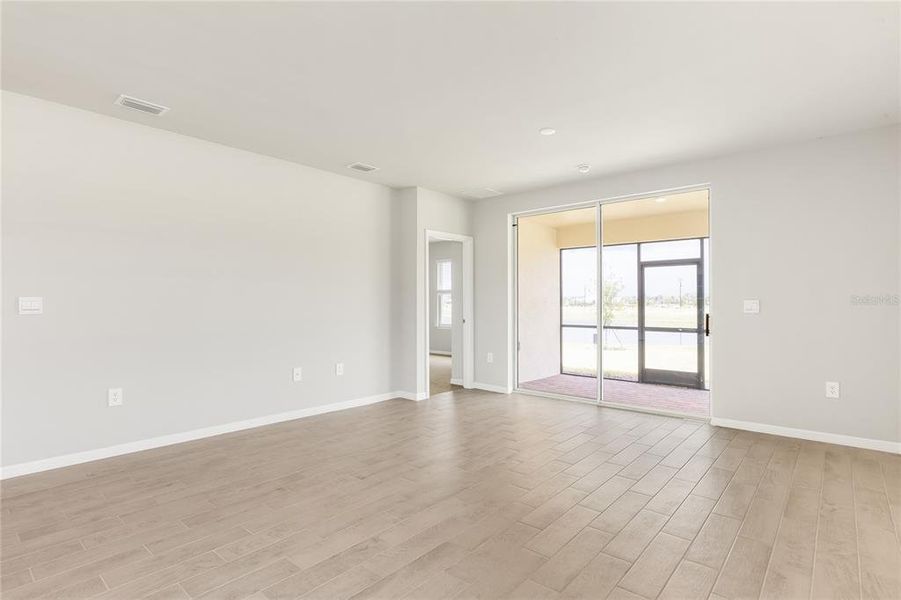 Spacious, unfurnished interior of a new home in Cove at West Port - Tradition, Port Charlotte (Image 15).