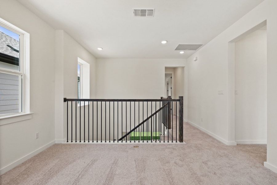 Spacious, unfurnished interior of a new home in Heritage, Dripping Springs (Image 49).