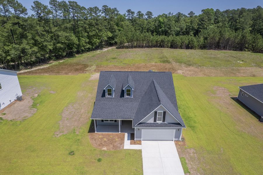 Front exterior of a new home in , Dorchester, SC, highlighting curb appeal (Image 27).