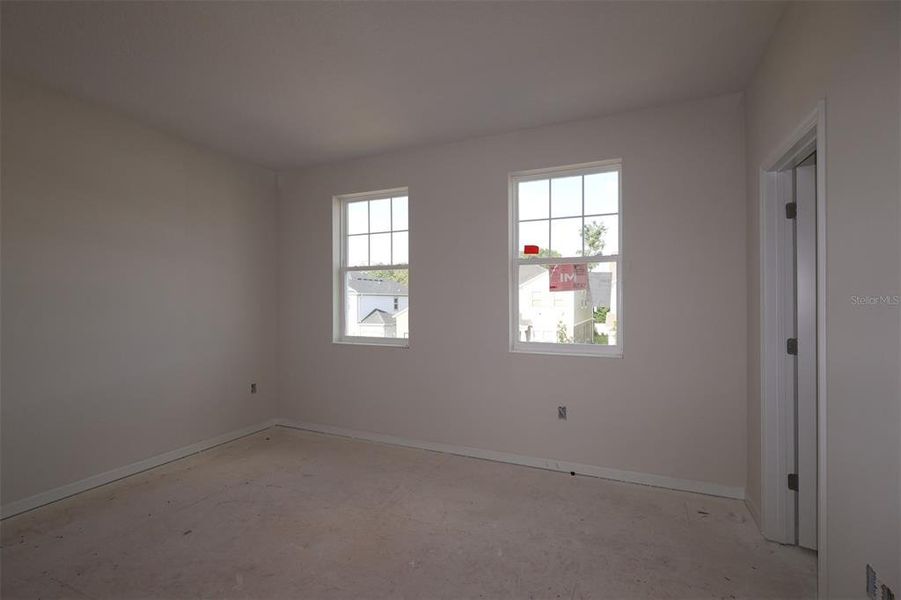 In-progress construction of a new home in Emerson Pointe, Apopka, FL (Image 9).