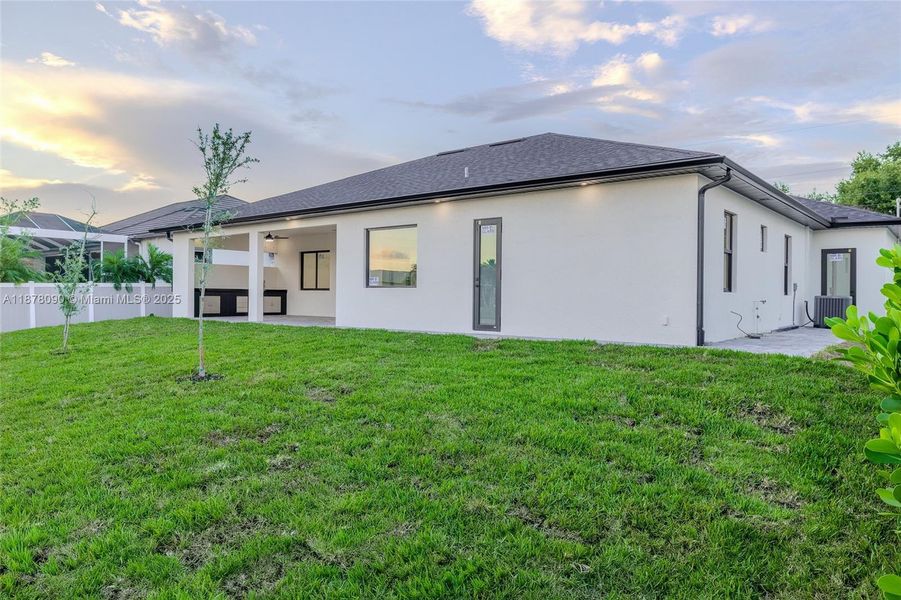 Front exterior of a new home in , Cape Coral, FL, highlighting curb appeal (Image 22).