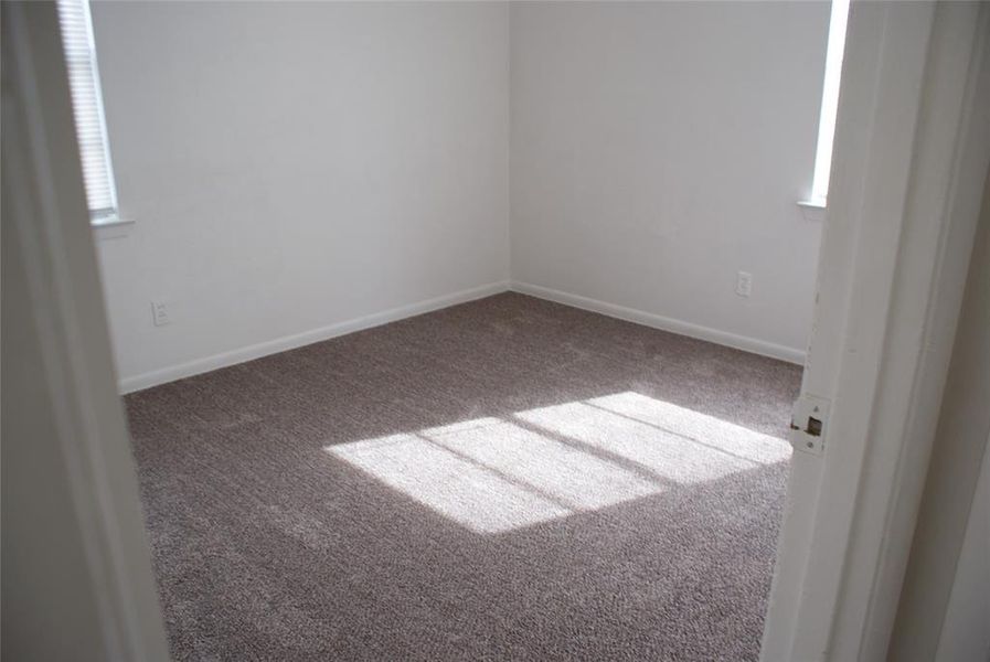 One of the 3 bedrooms. Two windows makes this bedroom nice and bright with natural light.