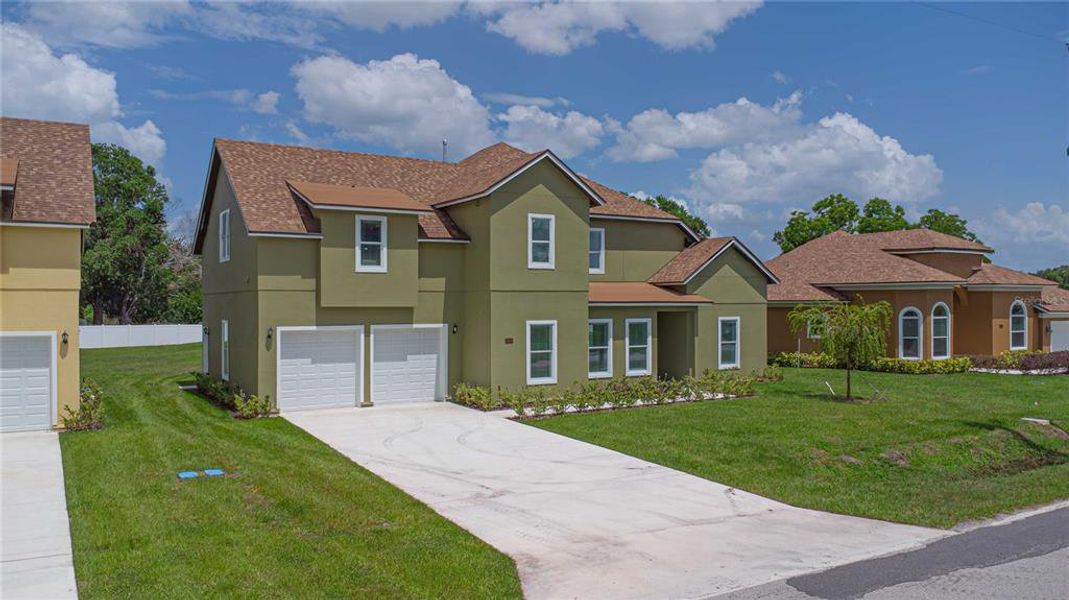 Front exterior of a new home in , Sanford, FL, highlighting curb appeal (Image 24).