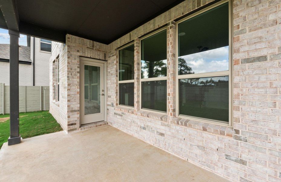 Exterior details and patio area of a home in Wolf Ranch, Georgetown (Image 19).